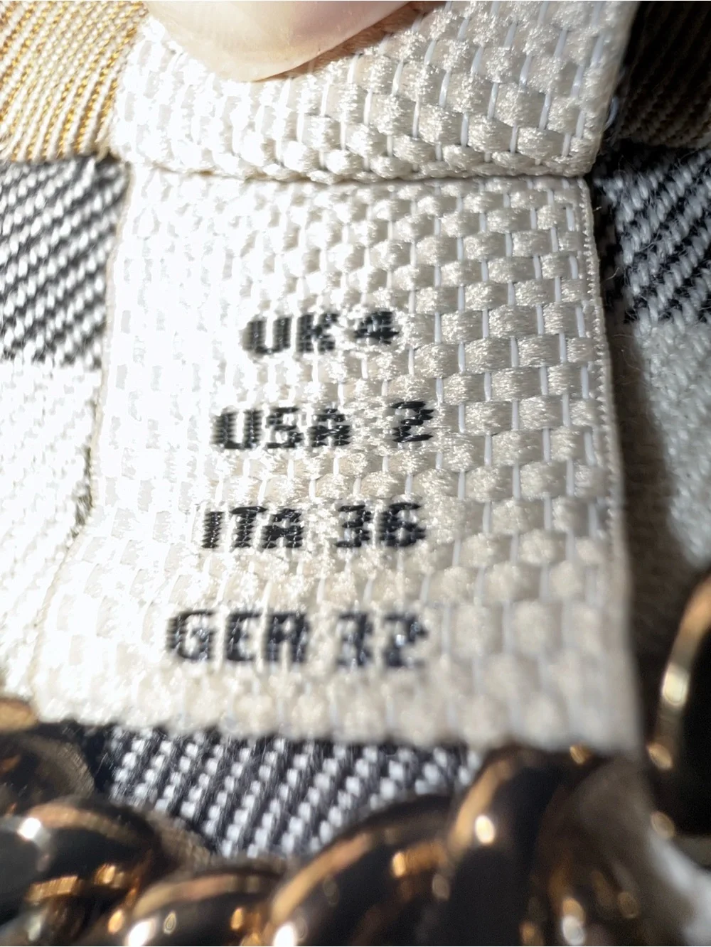 Burberry Beige and Black Nova Check Label Close-Up with Gold Chain Detail - Picture 2 of 16